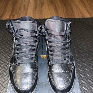 Authentic All Black Jordan 1 Mid lightly used.